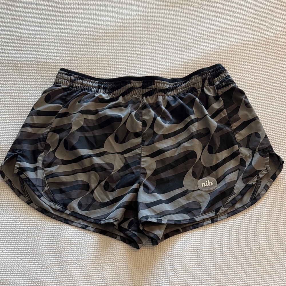 Nike Women's Athletic Shorts with Black and Gray Wave Pattern. Size Medium.